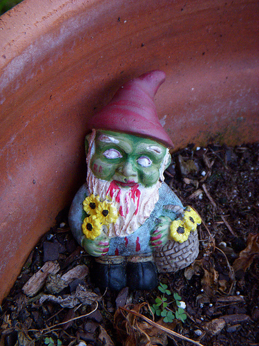 Zombie Gnome eats brains, but starved too death in a Hollywood Studio executives meeting